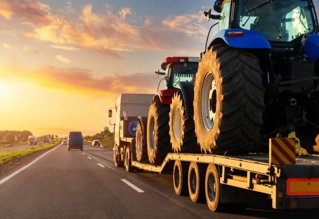 vehicles-road-against-orange-sky-scaled.jpg
